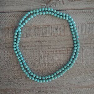 Long heavy speckled turquoise look beaded strand necklace